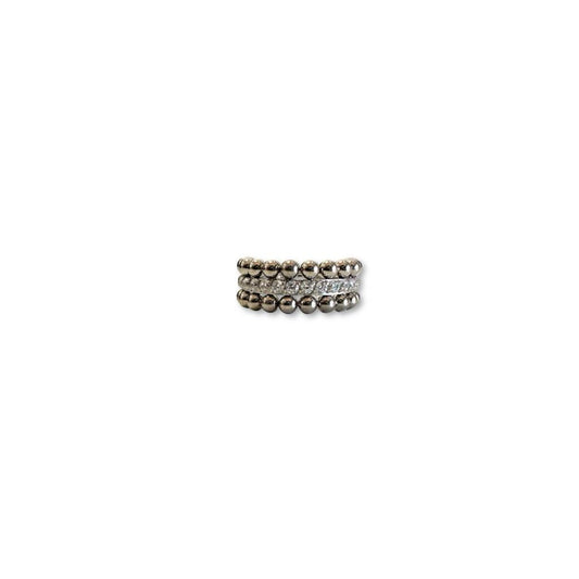 Argolla ASTM F136 - Segment ring con línea de zirconias lateral blanco y doble corona de bolitas